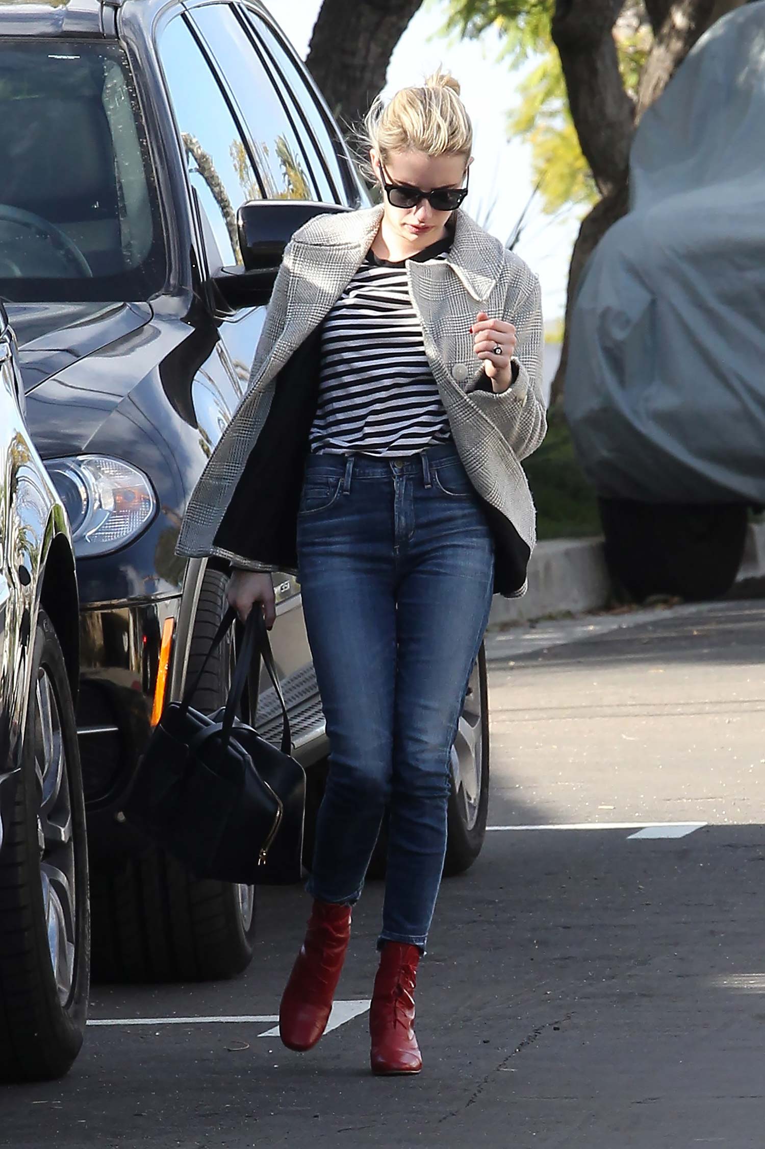 Emma Roberts dons a striped top with matching sunglasses while running  errands in Los Angeles