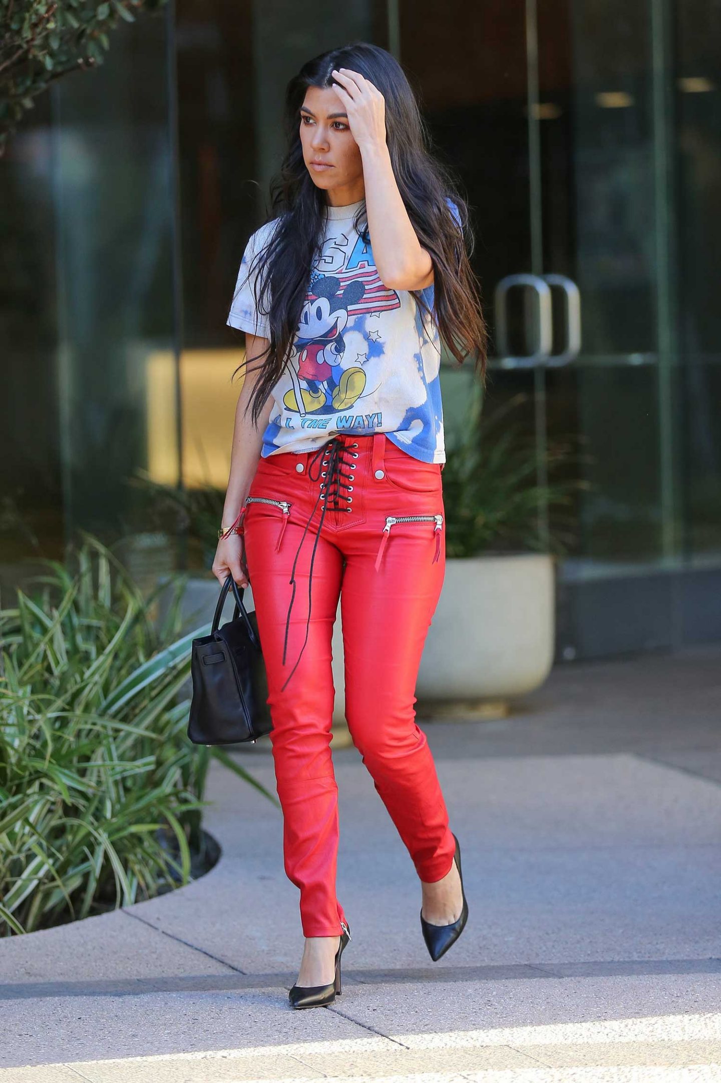 Kourtney Kardashian Wears Red UNRAVEL Leather Pants