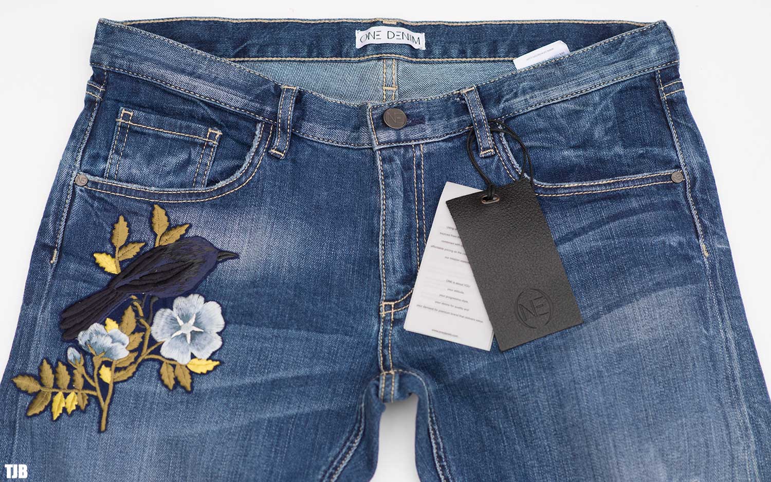 cuffed floral embroidered jeans