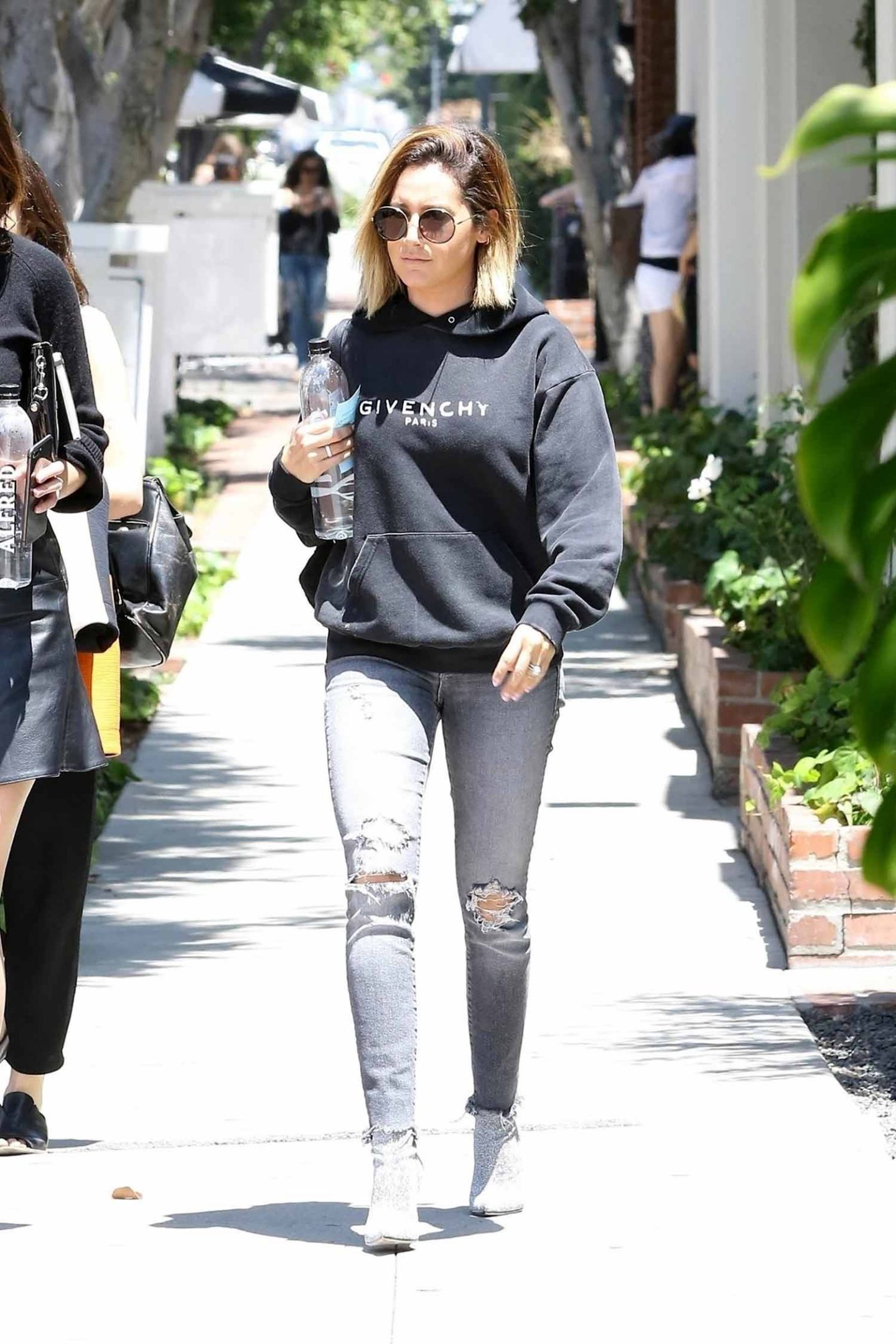 Ashley Tisdale dons a hoodie and leggings during a shopping trip