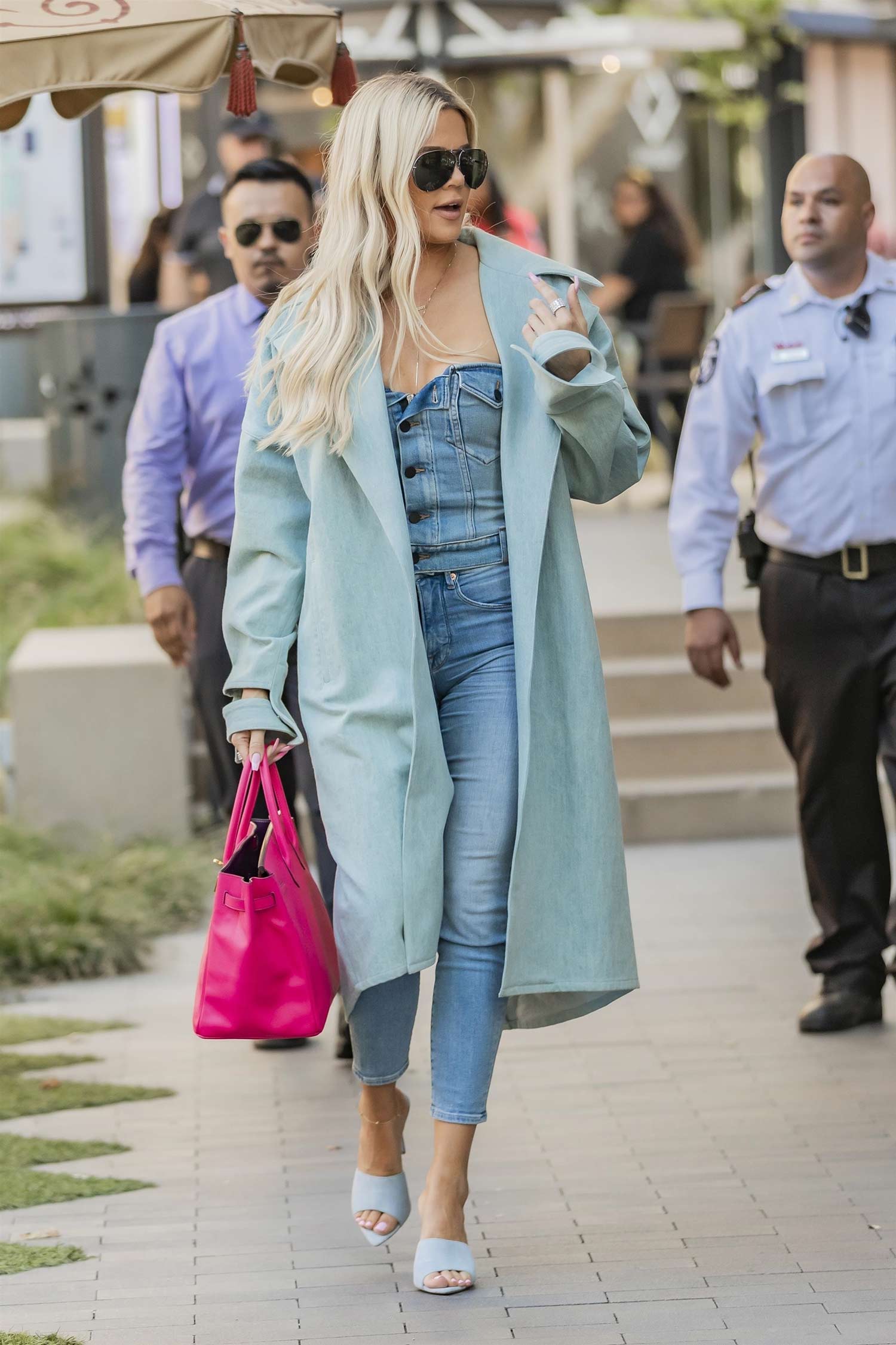 Khloe Kardashian goes BRALESS in jersey pantsuit after changing out of  skintight blue minidress on NYC trip | The US Sun