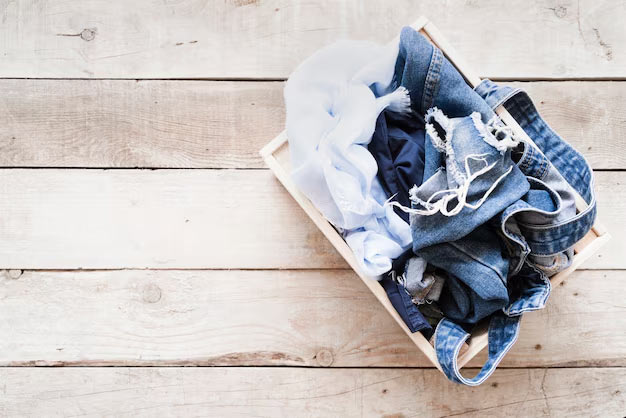 laundry basket with denim jeans